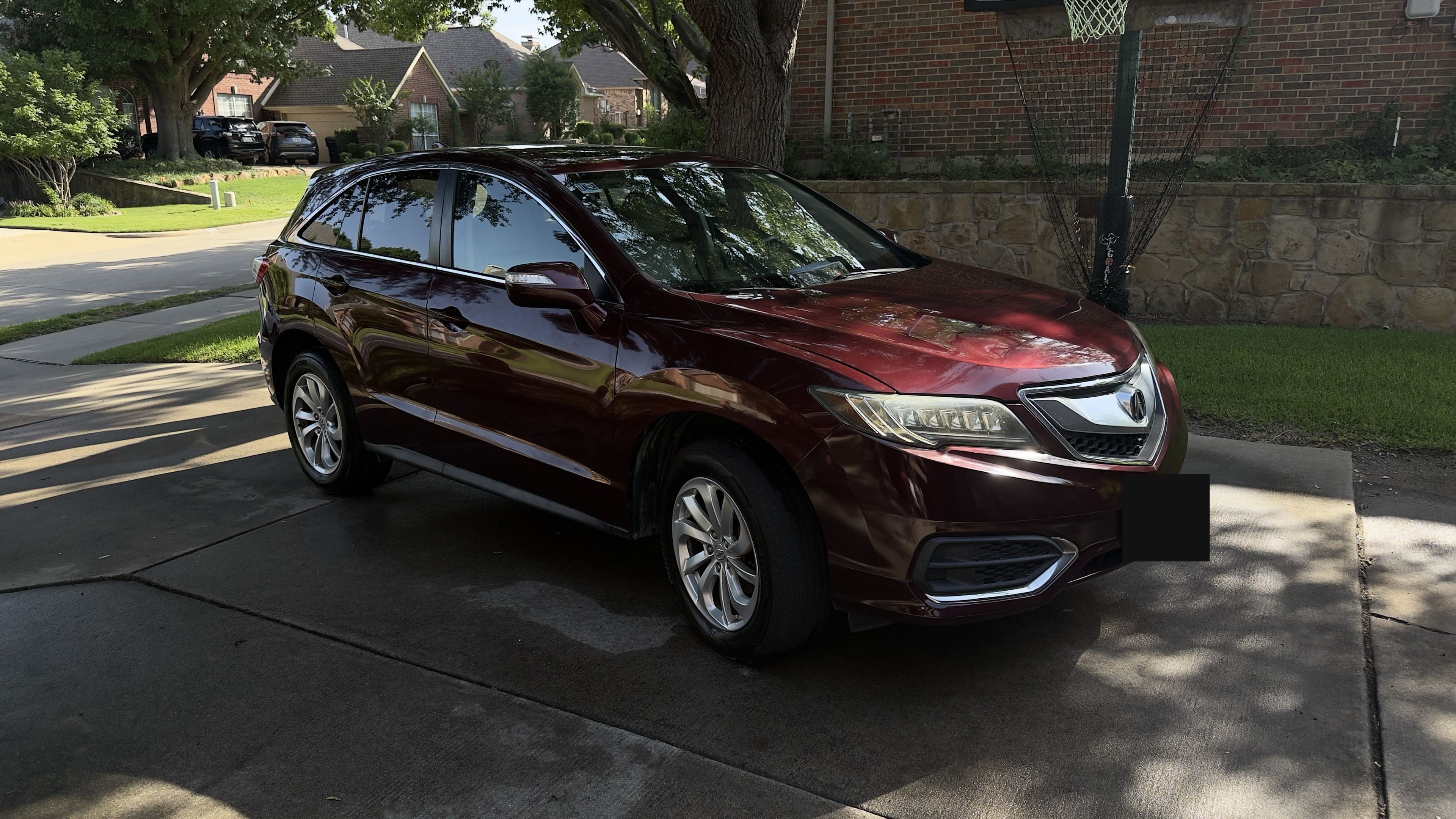 A glossy, freshly detailed Acura RDX — the kind of result Gas Details delivers