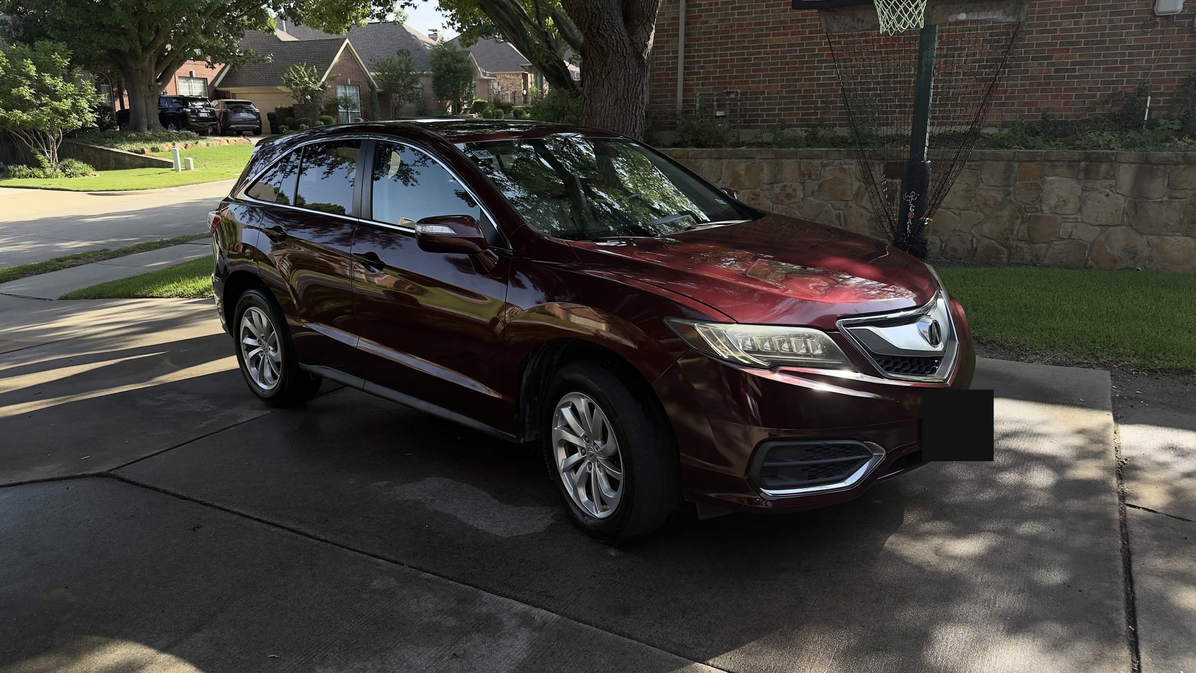 Glossy detailed SUV, front three-quarter view